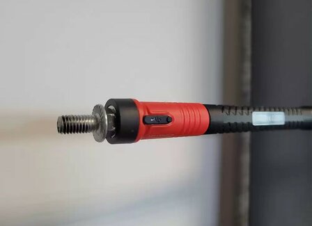 Rechargeable flashlight with magnetic gripper