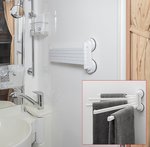 Towel holder with suction cups pivotal